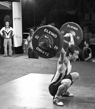 Side view of an Olympic weightlifting snatch performed by Tom Goegebuer, Belgium.