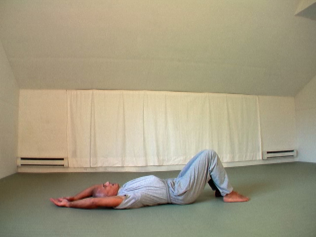 Thoracic spine mobility test--supine arm flexion